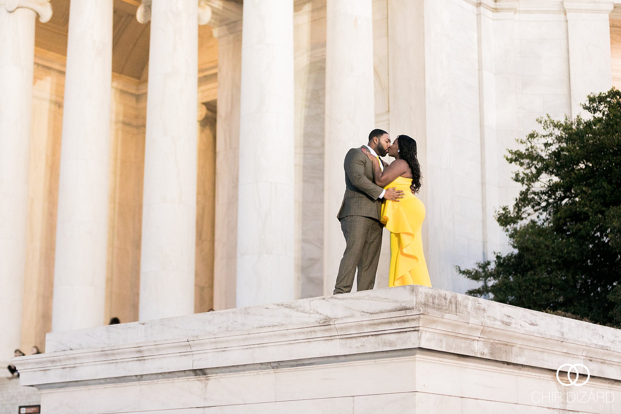 couple shoot featuring yellow dress at the Jefferson Memorial D.C. Engagement Shoot