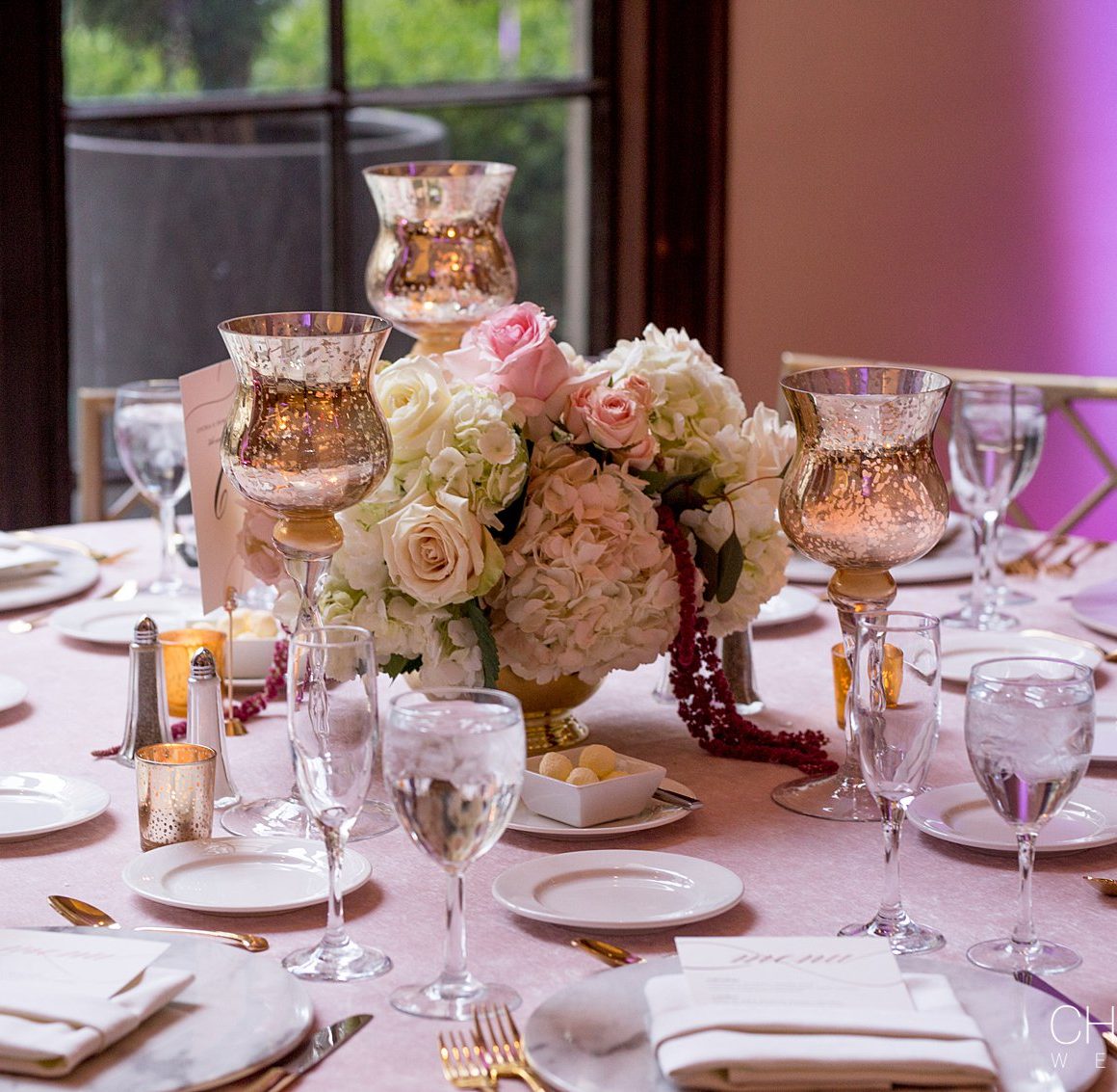 ivory and pink table decoration in the promenade room at the Westin Georgetown Wedding